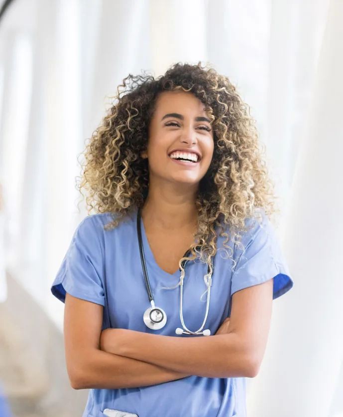 Smiling nurse in scrubs